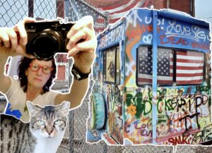 Selfie with camera, RV graffiti and cat